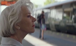 Movie image from Betty and Roy sitting on station platform