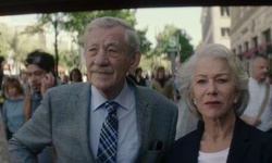 Movie image from Betty and Roy emerge from Hotel Adlon Kempinski