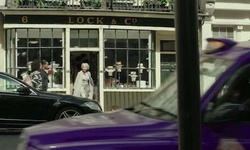 Movie image from Roy and Betty walk out of Lock & Co,